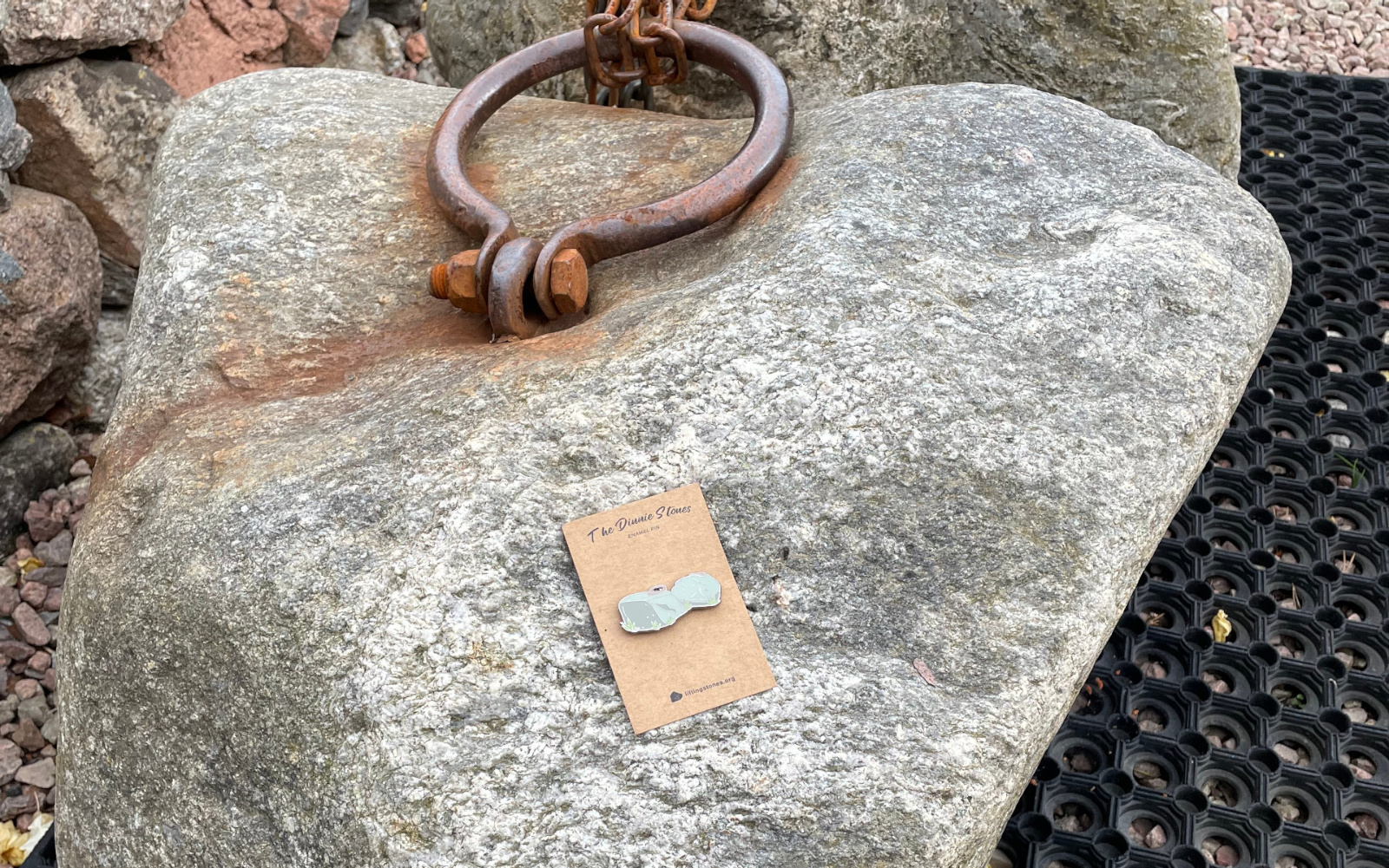 An image of Dinnie Stones enamel pin
