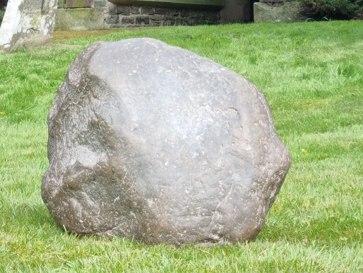 The Maegen Stone sat outside the church at Mainstone