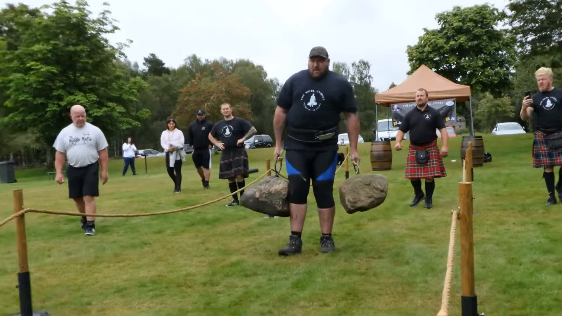 Andy Black carrying the Nicol Walking Stones