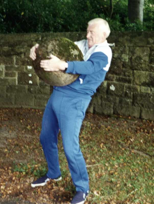 Peter Martin Sr. lifting the Ladykirk Stone