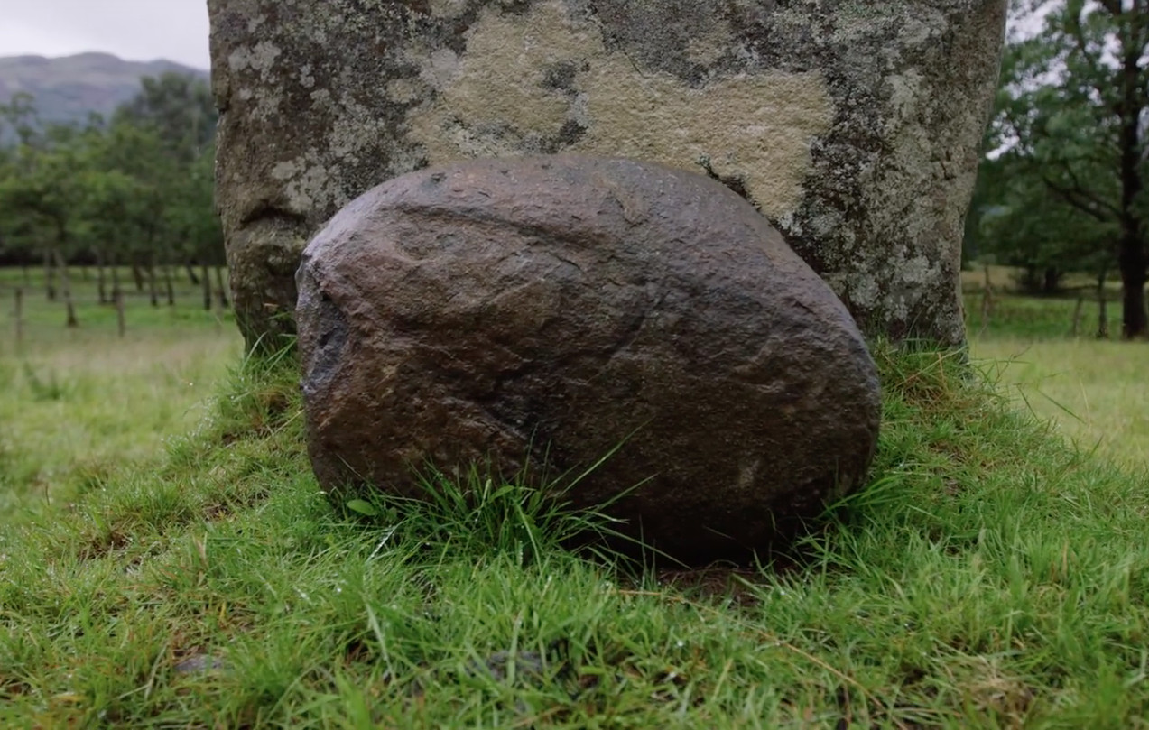The Puterach stone sat on the ground in front of the Pudrac plinth