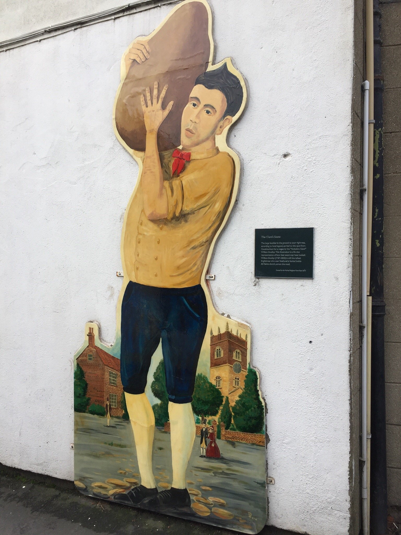 The mural next to the stone